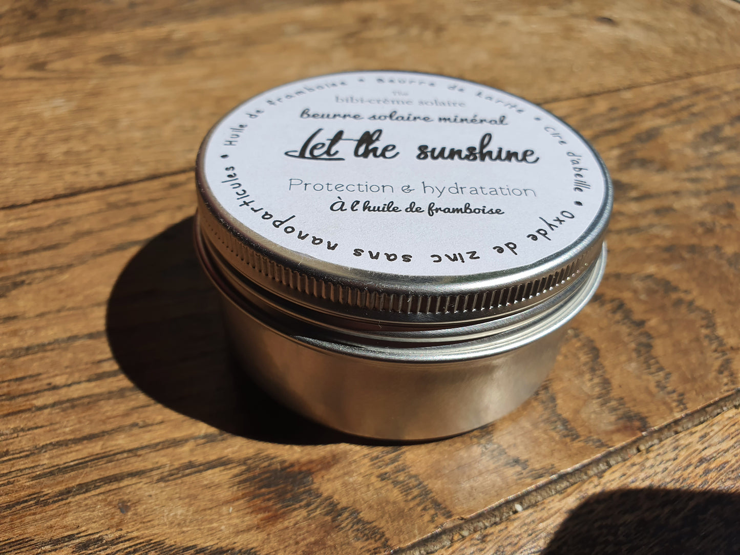 Le "Let the sunshine", beurre solaire protecteur, crème solaire minérale anti UV à l'oxyde de zinc, huile végétale de framboise, beurre de karité et cire d'abeille sans nanoparticules