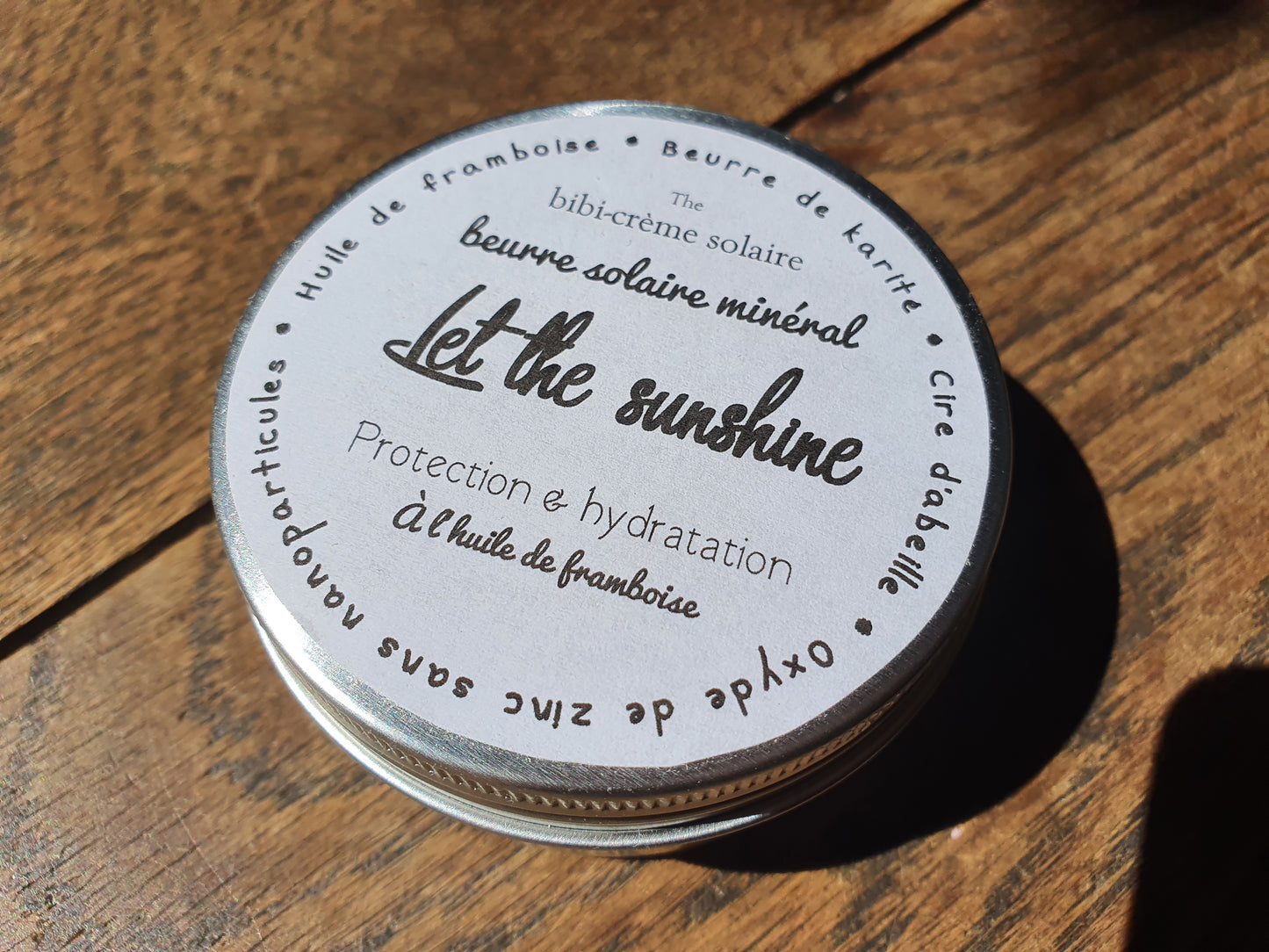 Le "Let the sunshine", beurre solaire protecteur, crème solaire minérale anti UV à l'oxyde de zinc, huile végétale de framboise, beurre de karité et cire d'abeille sans nanoparticules